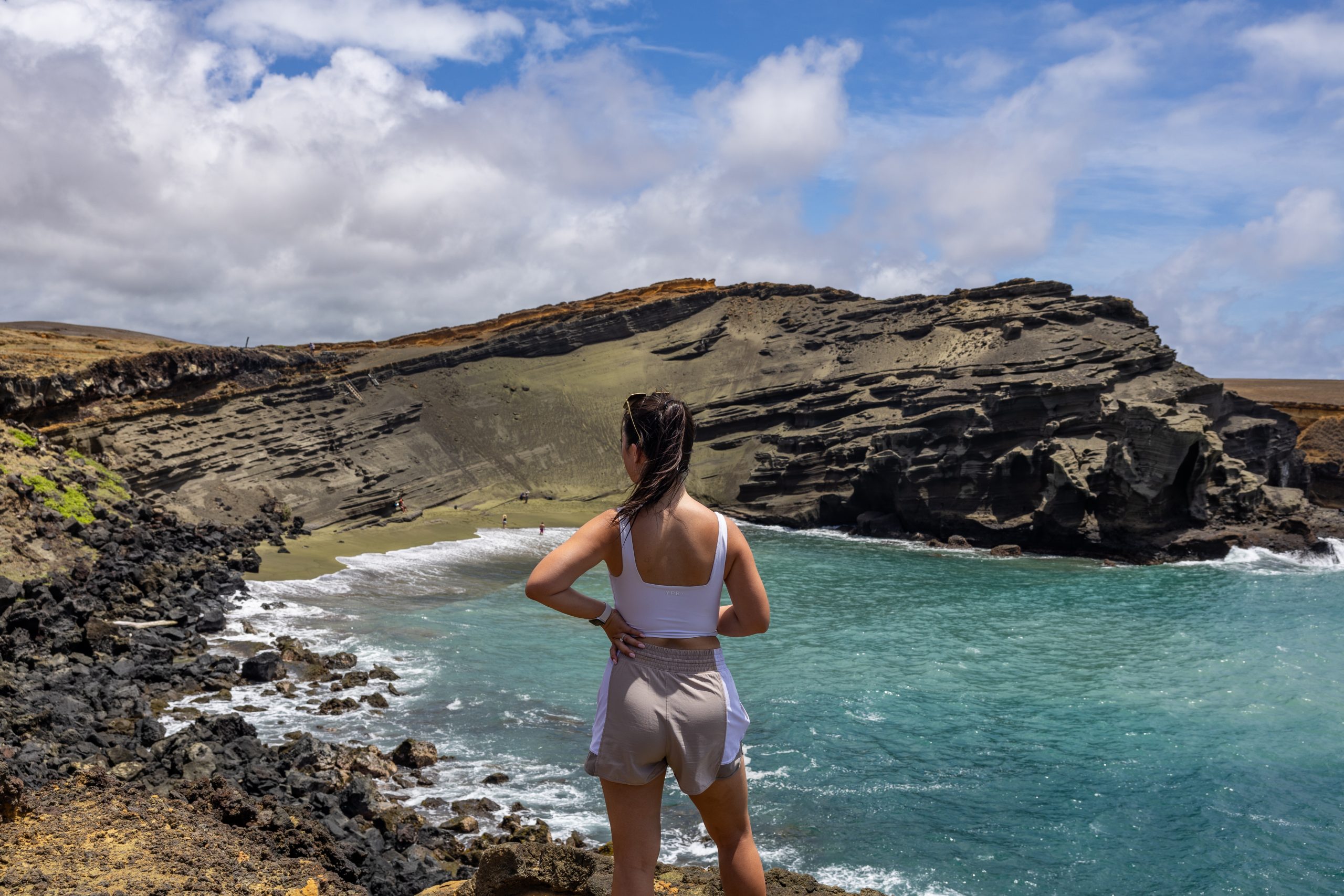 kelly chen at papakolea green sand beach on big island hawaii